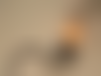 Wiring contractor concealing TV wires in modern living room