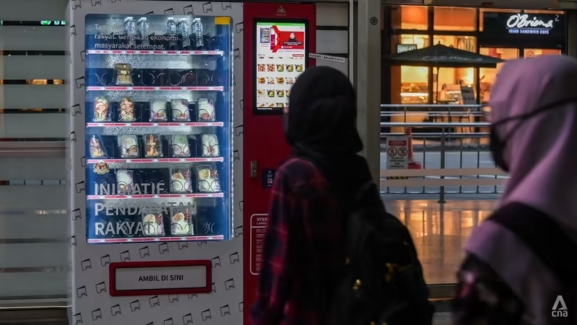 How much does a book vending machine cost in Malaysia
