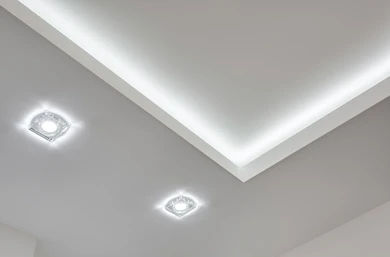 L-box plaster ceiling with LED strip lighting in modern Kuala Lumpur condo