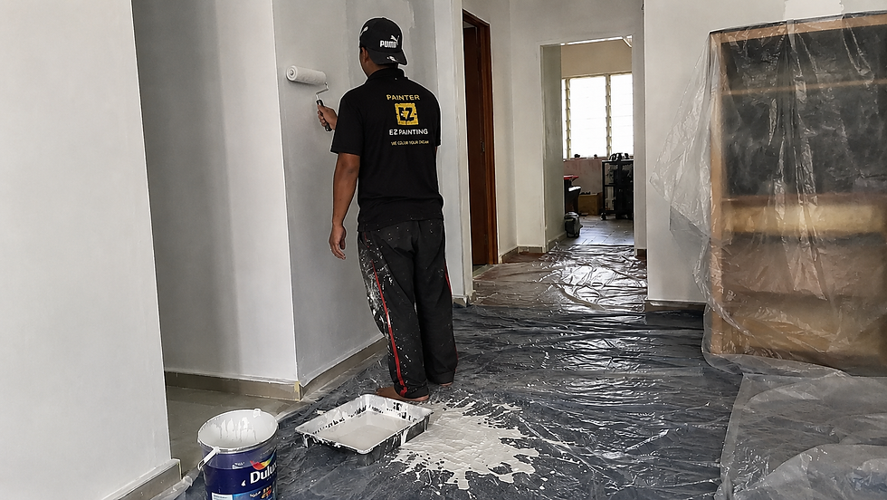 Water-based paint being cleaned with a wet cloth