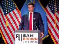 Brown campaign stuck in a ditch on the side of the road