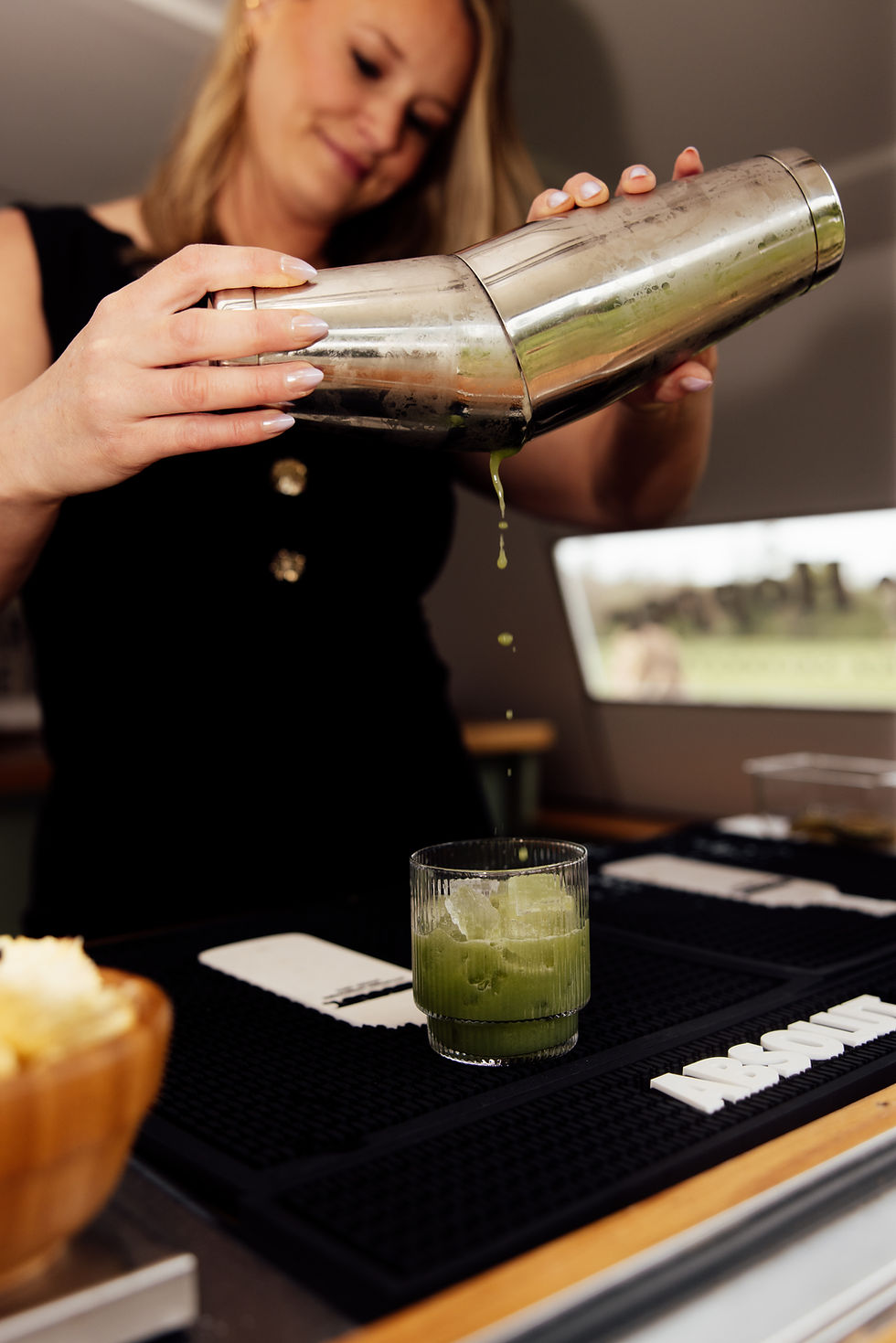 bartender pouring drink