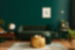 Luxury living room in house with modern interior design, green velvet sofa, coffee table,