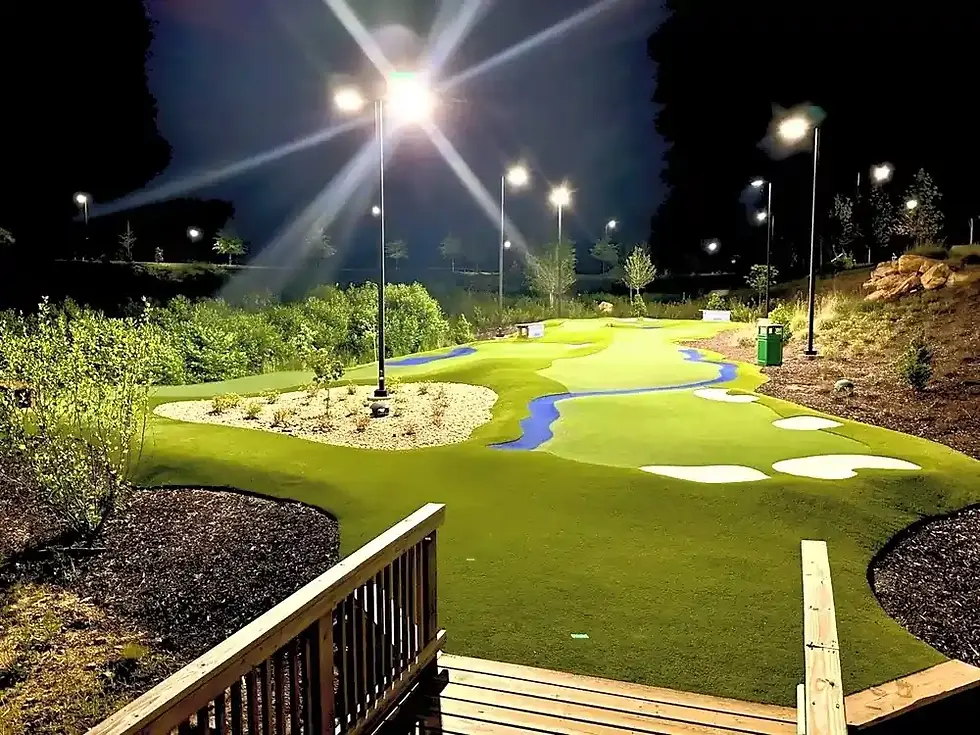 Standing view of an entire mini putt putt hole and its layout.
