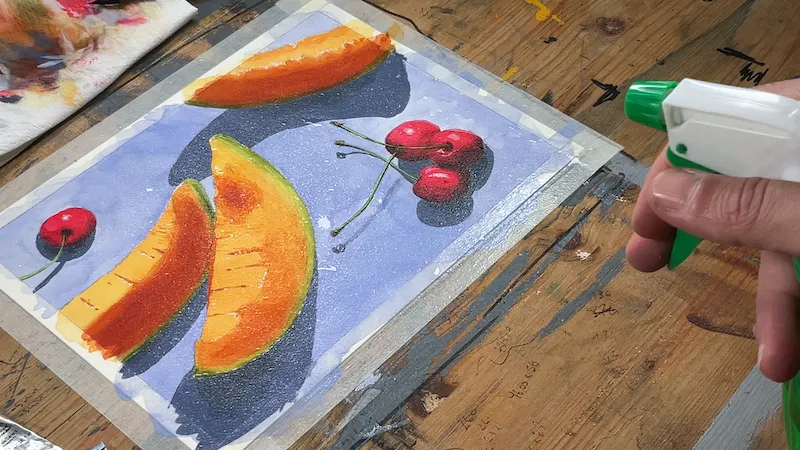 Inumidisco il lavoro nebulizzando dell'acqua attraverso uno spruzzino