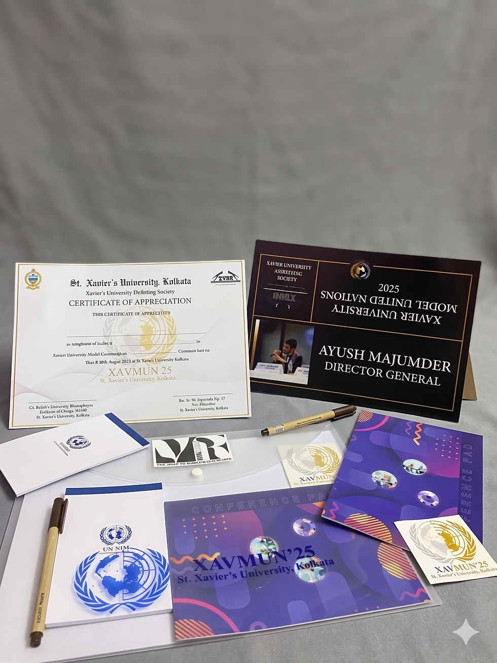 Premium stationery bhopal including customized certificates and notebooks.