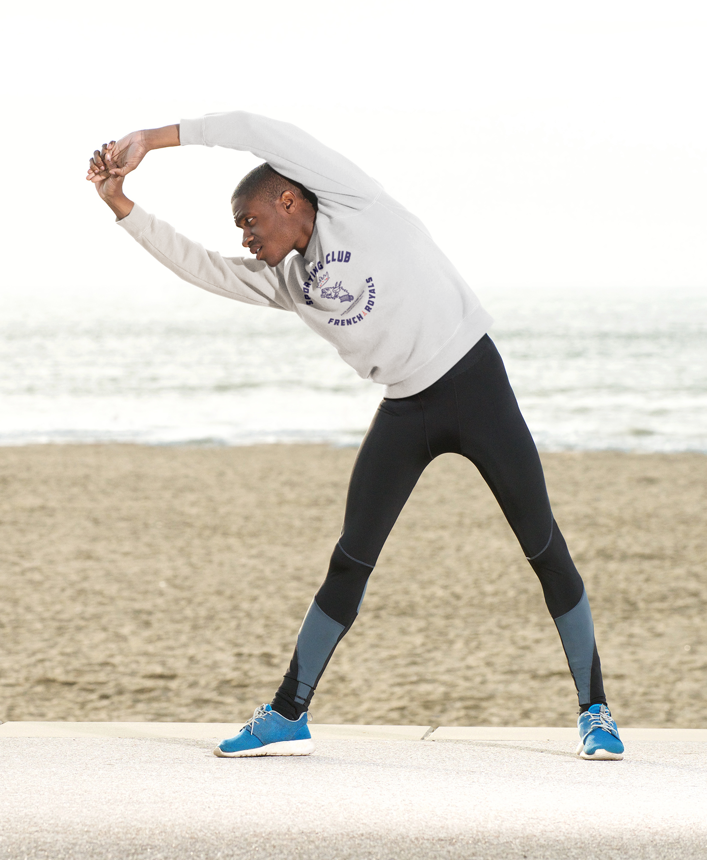 S-Club_moodboard_sweatshirt-mockup-of-a-man-stretching-by-the-beach-38834-r-el2.png