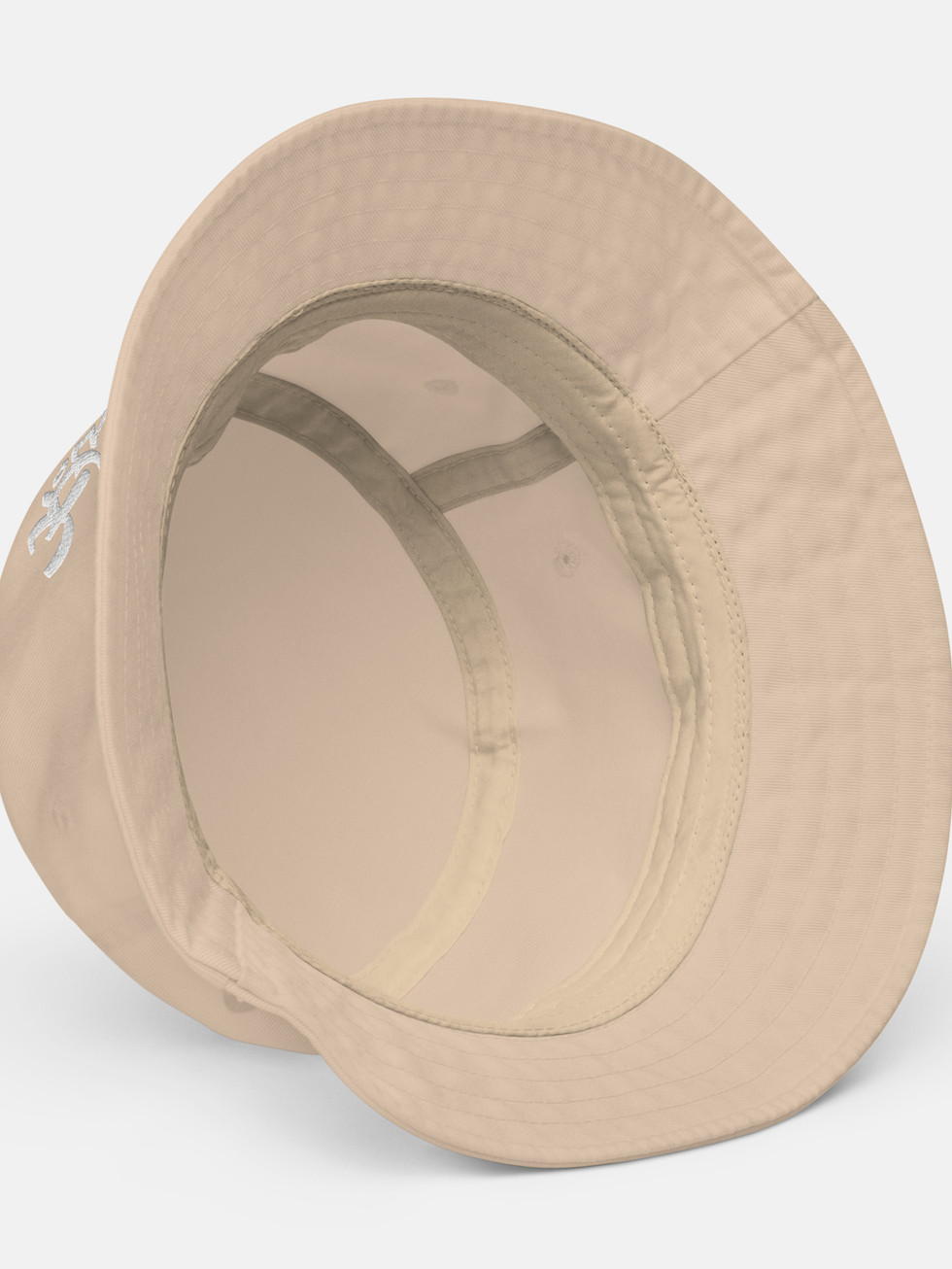 zoom sur finition interieures d'un bob de couleur beige