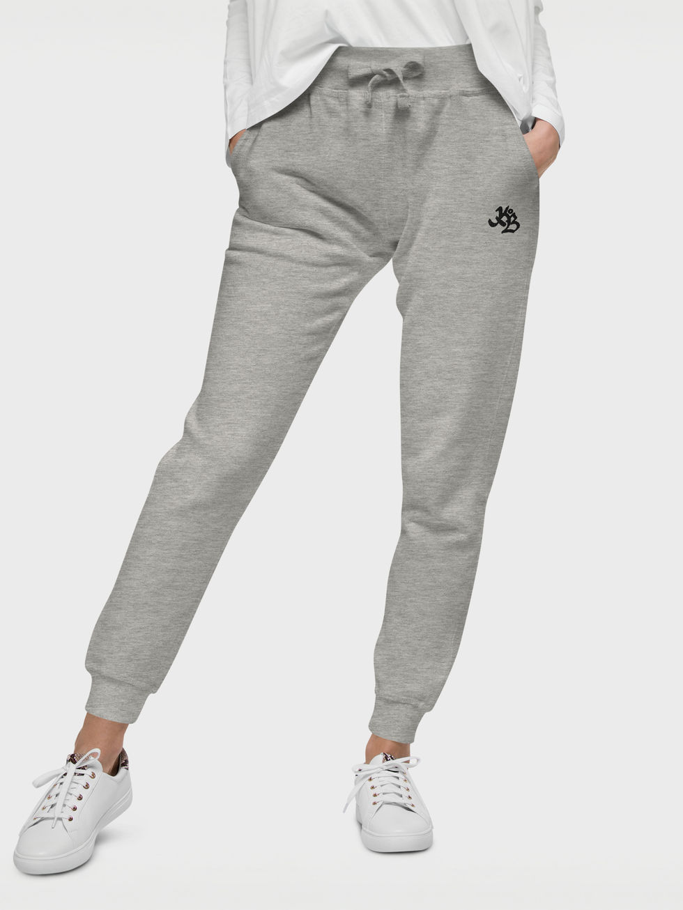 front view of female legs in a grey jogger pant with a Krew Of Ballers logo black embroidery under left pocket enter