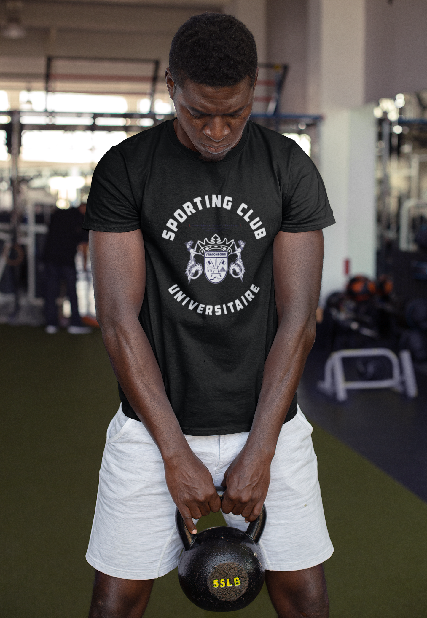 S-Club_moodboard_black-tee_Male-holding-a-kettlebell-at-the-gym-23641.png