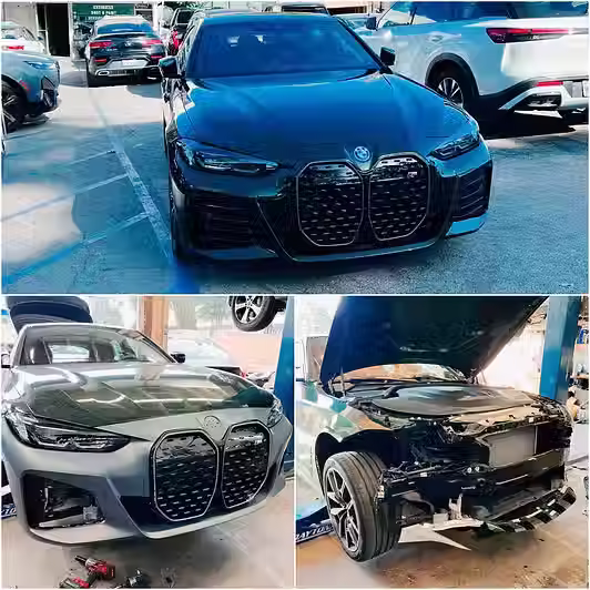 Car undergoing collision repair at a professional auto body shop in Woodland Hills.