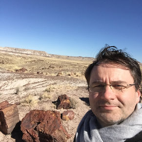 Selfie in front of petrified wood field in AZ