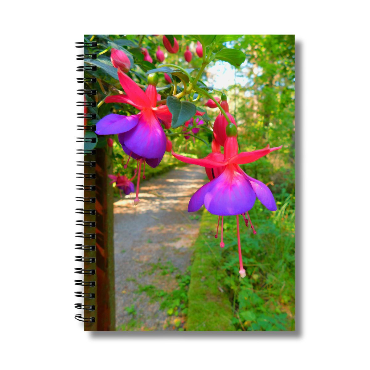 Fuchsia flowers photograph on the cover of a notebook