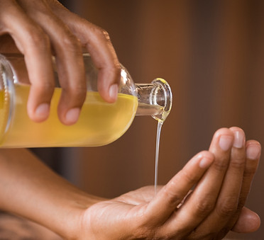 Pouring Massage Oil_edited_edited.jpg