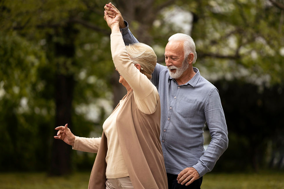 medium-shot-senior-couple-dancing-park.jpg