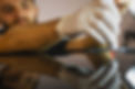 Photo of a process dent removing without paint, young professional worker makes dent repai