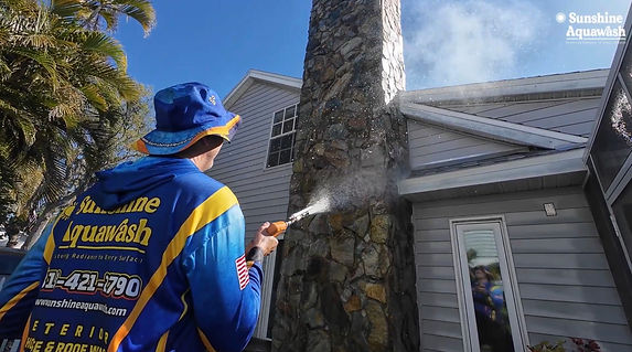 Sunshine AquaWash in Ellenton Washing a Home