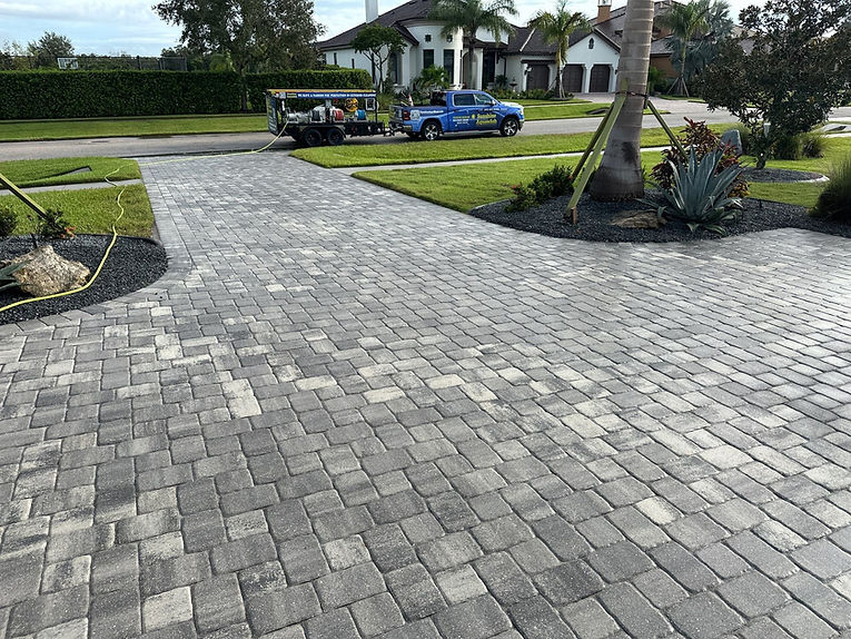 Pressure Washing Sunshine AquaWash Truck & Trailer after driveway cleaning