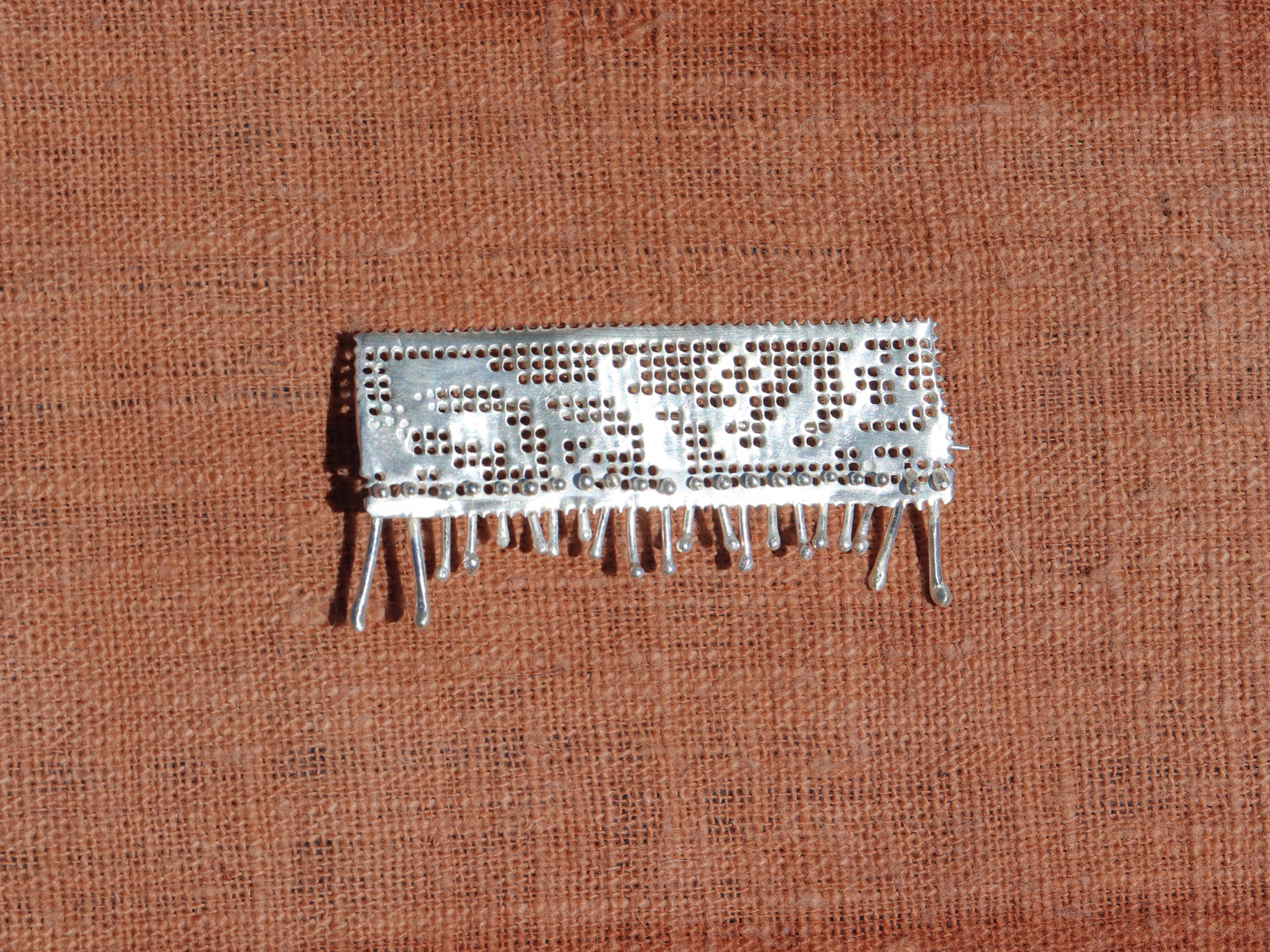 WEAVERS PIN
