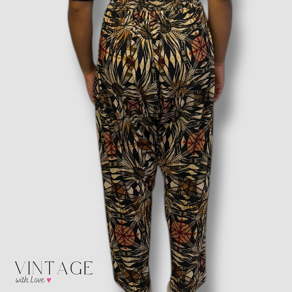 Thumbnail: Michelle Ludek black, orange and yellow floral patterned pants - Size L