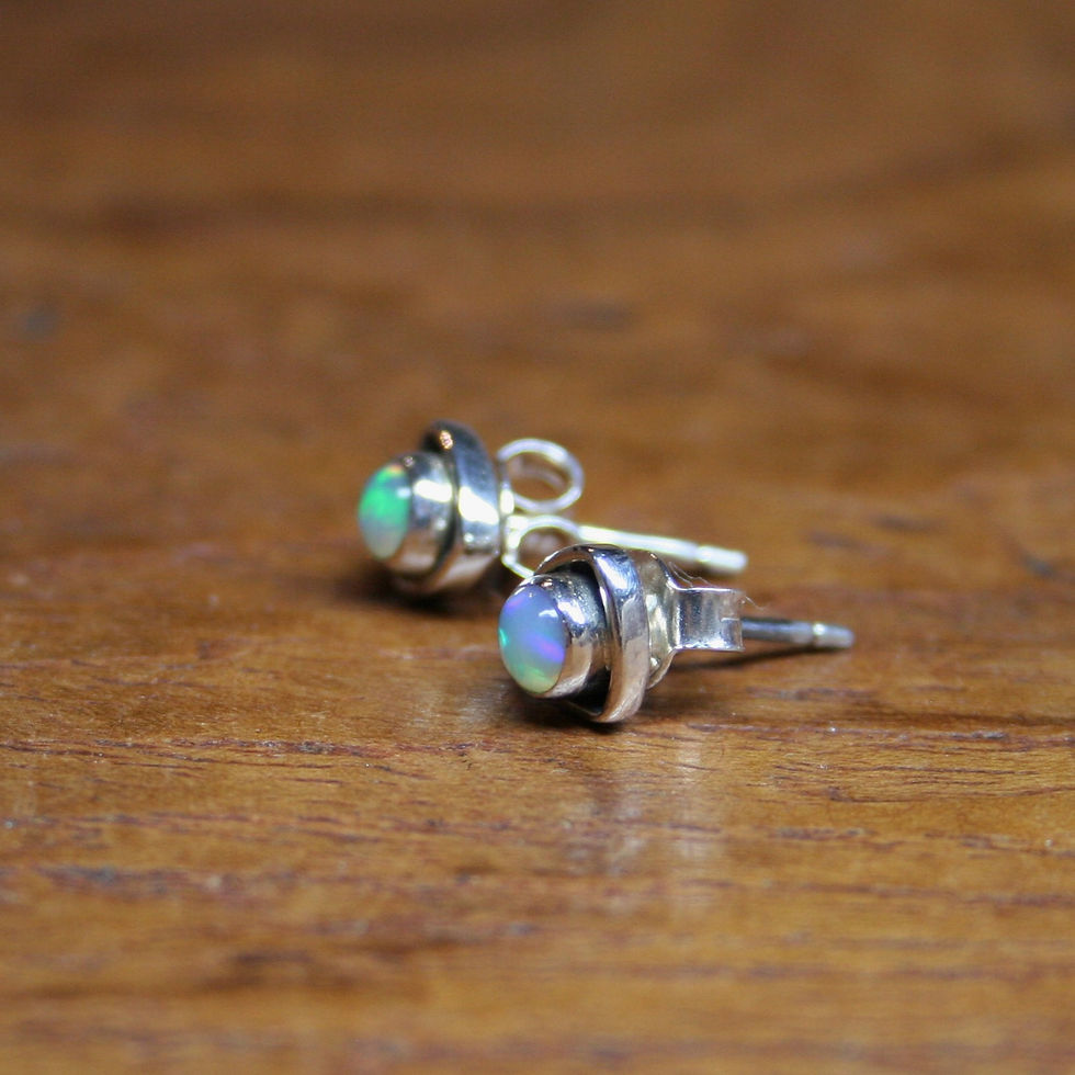 Thumbnail: Opal Studs in a Silver Setting