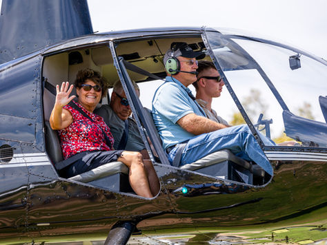 A group of friends on a helicopter tour