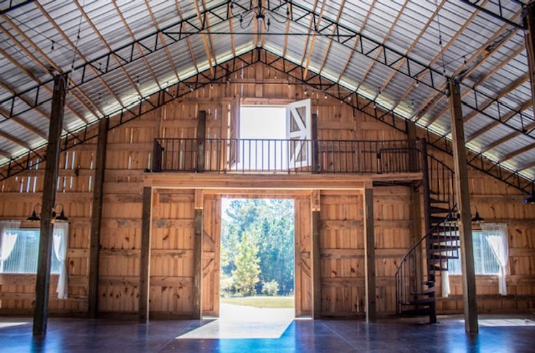 Inside the Tin Roof Barn during a sunny day