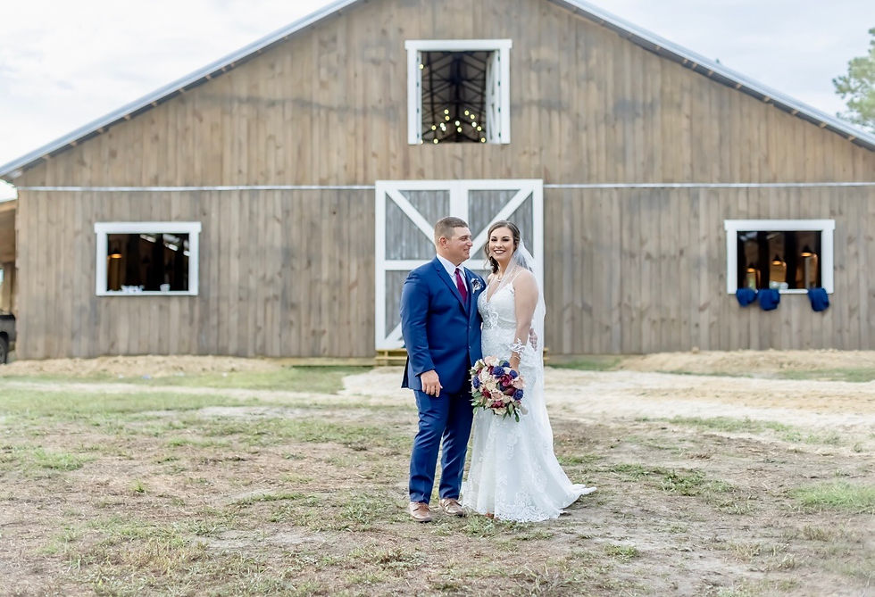 Mr. and Mrs. enjoying the view in front of the barn