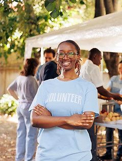 young-black-woman-with-glasses-stands-ou