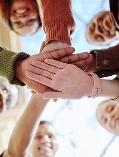 below-hands-stack-and-group-of-students-for-motivation-support-or-education-in-summer-suns