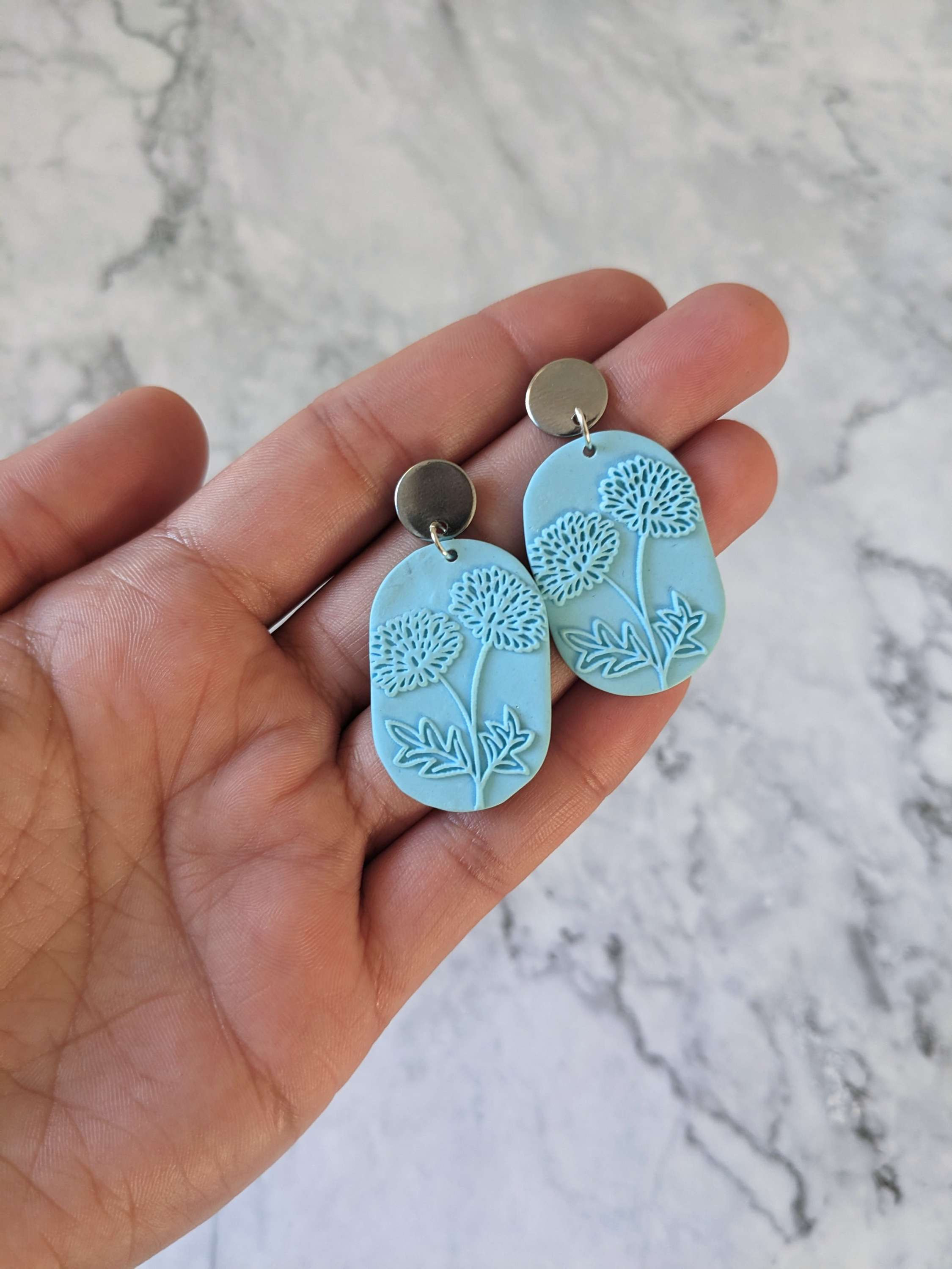 Pale Pastel Blue Flower Imprint Earrings - Large