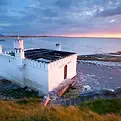 Historic Eniscrone Seaweed bathhouse.webp
