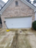 Pressure washing machine on dirty driveway, exterior cleaning
