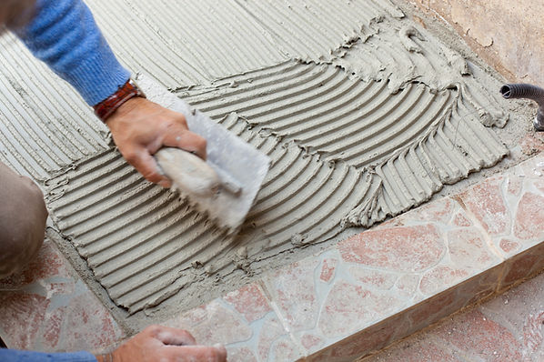 laying tile on the floor