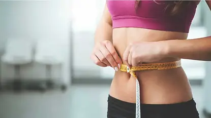 woman-measuring-stomach-1296x728.webp