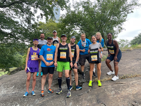 Daniel Chironno with runners at the 2025 NYRR Team Championships in Central Park, New York.