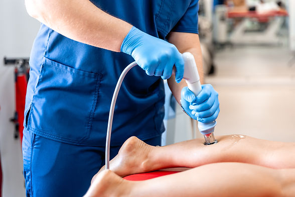 physical-therapy-shin-with-shock-wave-extracorporeal-shockwave-therapy.jpg