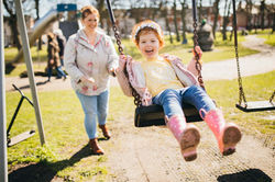 Mom and Daughter in Playground