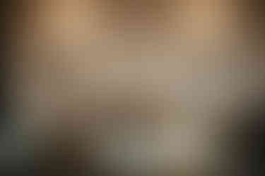 Sweetheart table with candles and string lights backdrop at Houston reception.