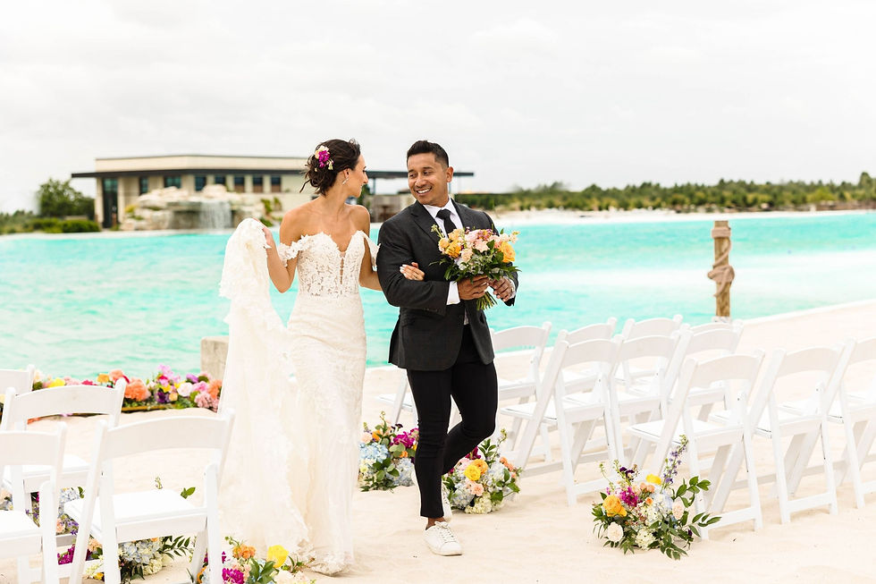 bride and groom on the beach Houston Wedding Planner.