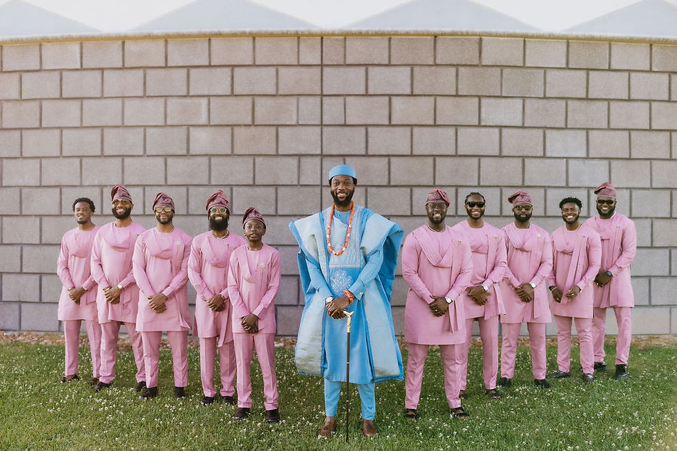 Groom and groomsmen confidently lineup in traditional Nigerian attire
