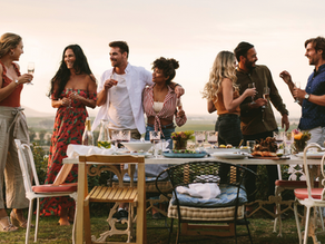 group of friends enjoying an outdoor garden party