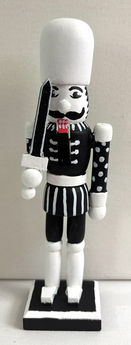 6" Black and white nutcracker with dots and stripes and white hat