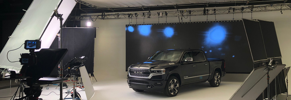 GMC on white cyc led wall sound stage