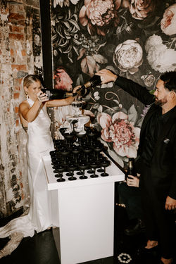 Brisbane Wedding | Bubble Over Champagne Tower | Black Glasses | White Stand