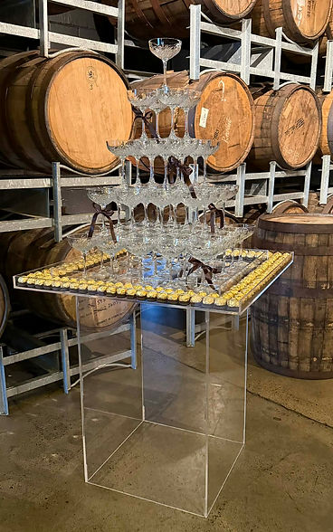 Ferrero Rocher Bubble Over Champagne Tower Towers Fountain Events Weddings Gold Coast Brisbane Sunshine Coast Display Tray Timeless Glasses Clear Acrylic Stand Chocolates Ceremony Reception