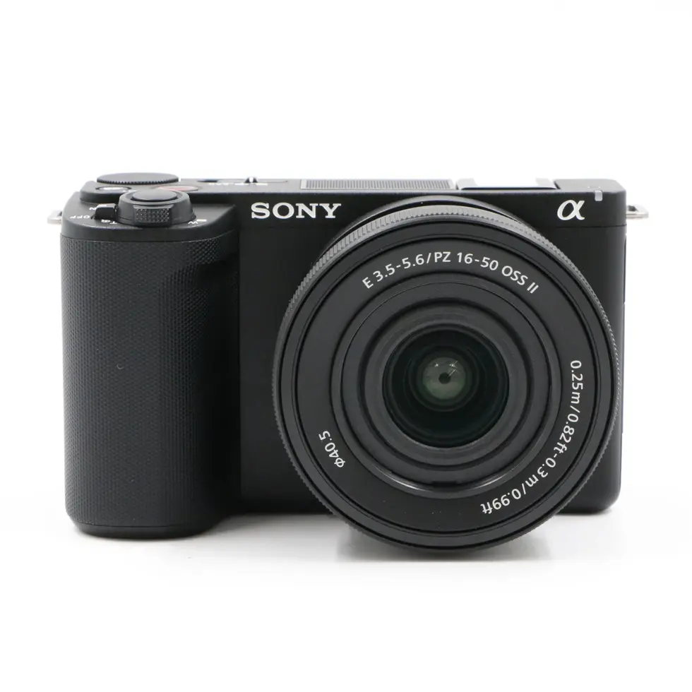 Black Sony Alpha camera with lens on white background Nikon Z6 II Vescar