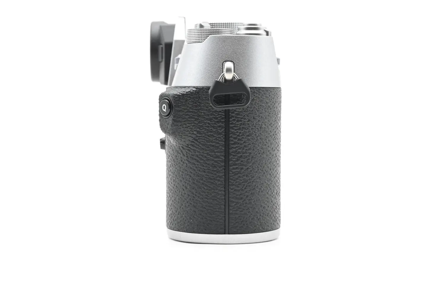 Side view camera body with silver and black construction, isolated on white background
