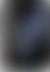Dark gray iPhone 11 Pro with a cloudy background display, product shot