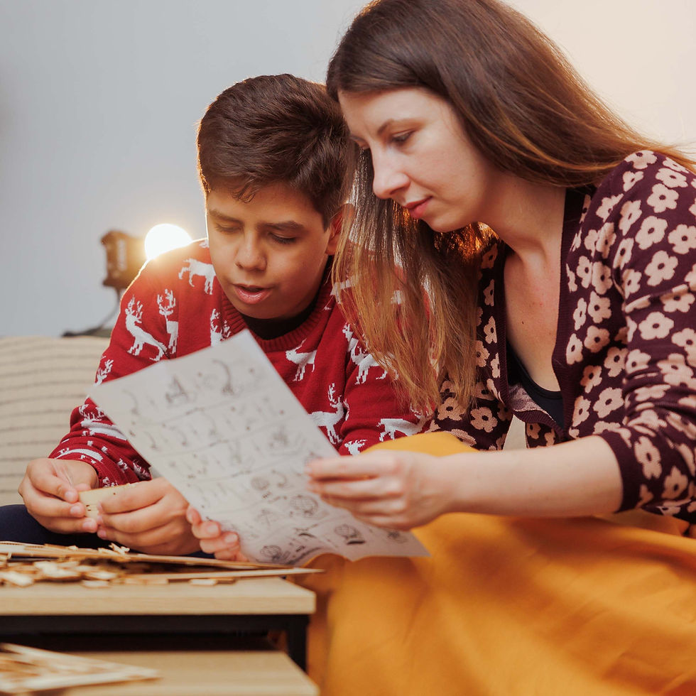 Thumbnail: A family gathered around a table, working together to build a 3D wooden model.